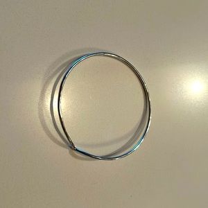 Sterling silver bangle with a chevron shape for a more delicate look.